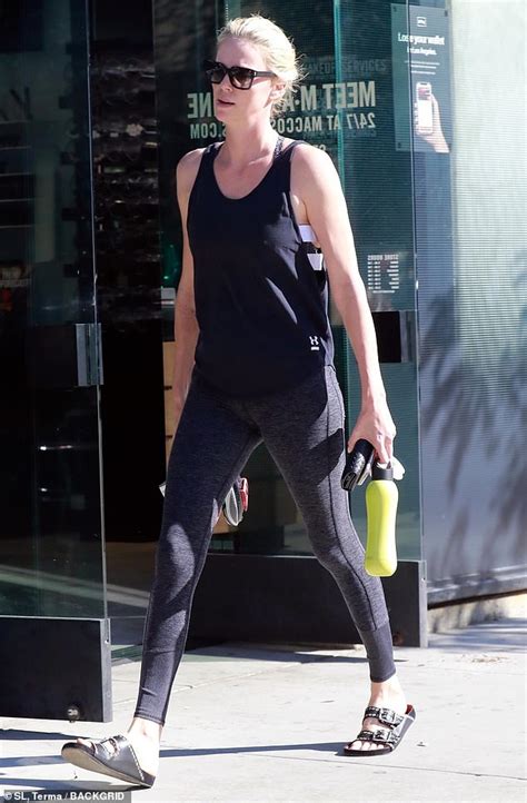 Charlize Theron Emerges From Soulcycle Class With Flushed Face And Bananas Under Her Arm Daily