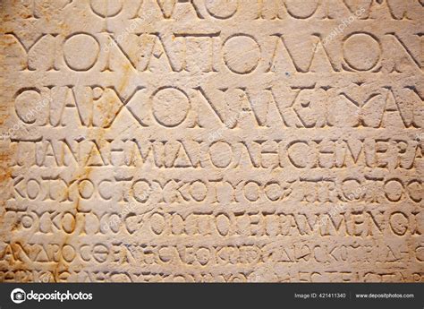 Fragment Ancient Greek Letters Carved Stone Stock Photo By ©swisshippo