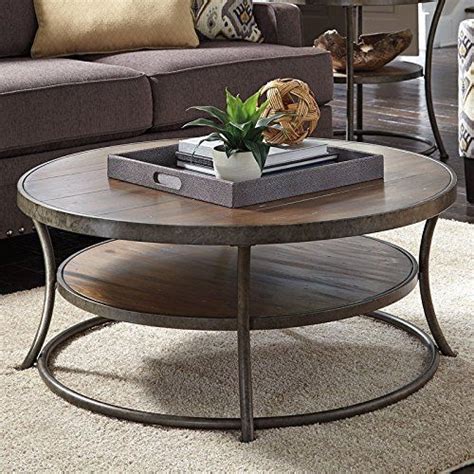Ashley furniture homestore fargo sihtnumber 58104. Nartina Round Cocktail Table | Coffee table, Cool coffee ...