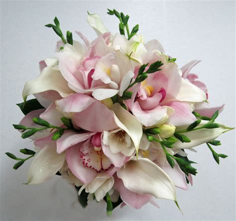 Soft Pink Cymbidium Orchids And Freesia In A Bridal Bouquet Flower Bouquet Wedding Freesia