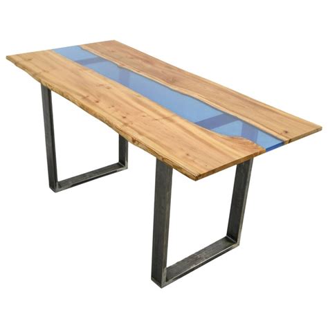 I'm a professional accountant and recently took up, as a hobby, building functional live edge epoxy resin furniture for my house in my spare time. Organic Modern Natural Live Edge Resin River Dining Table on Steel base For Sale at 1stdibs