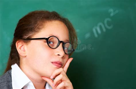 how do i solve this equation portrait of a cute brunette girl looking pensive in class stock