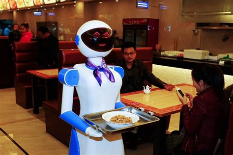 Robot Waiters In Japan Restaurant And Café