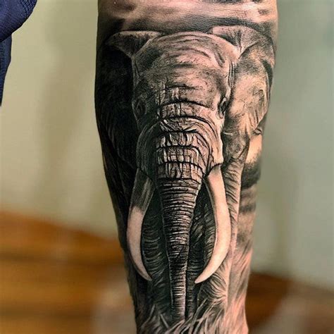 20 Powerful Elephant Tattoos For Men The Trend Spotter Elephant Head