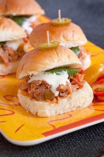 So what more can we do with pulled pork than just sandwiches? Southwest Pulled Pork Sliders from the Slow Cooker