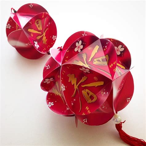 It reminds me of the decoration at publika. Handmade Decorative Lanterns from Used/Old Red Packets Ang Pow