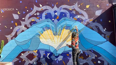 International Artist Adds New Mural Art On Ventura Main Street