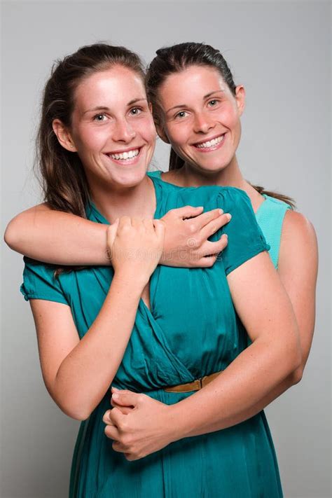Twin Sisters Hugging Vertical Stock Photos Free And Royalty Free Stock