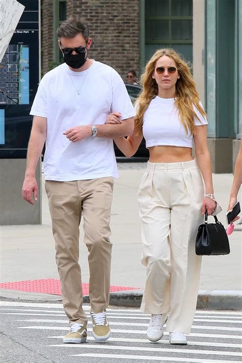 Jennifer Lawrence And Cooke Maroney Walk Arm In Arm Donning Matching