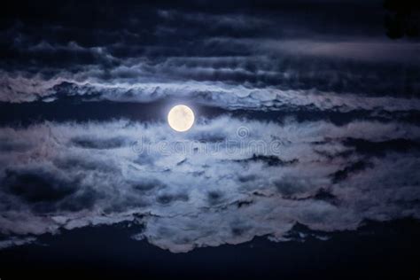 Bright Moon And Clouds In The Dark Night Sky Stock Photo Image Of