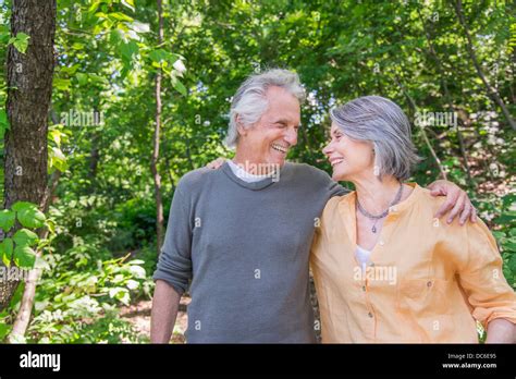 Senior Couple Relaxing In Park Stock Photo Alamy