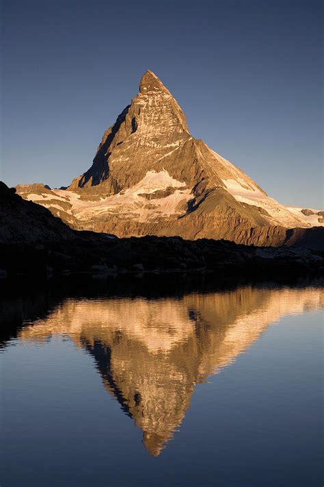 Matterhorn Reflected In Riffelsee Lake Photograph By Ingo Arndt