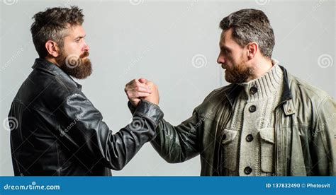 strong handshake friendship of brutal guys leadership concept true friendship of mature