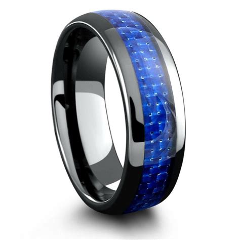 It's a symbol of love and commitment to each other. Mens Black Ceramic Wedding Band With Blue Woven Carbon ...