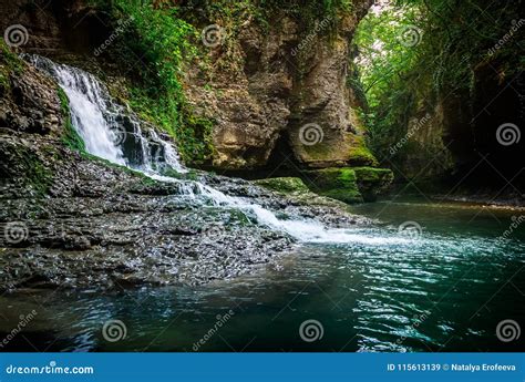 Amazing Forest Waterfall Flowing Into The Cold Mountain River Martvili