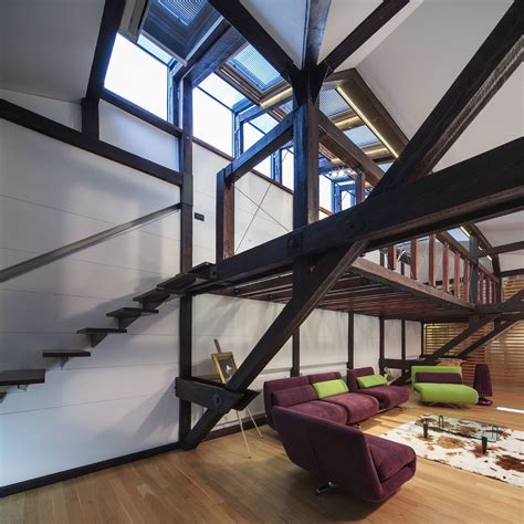 Wood Structure Defines Contemporary Renovated Attic Loft Apartment In