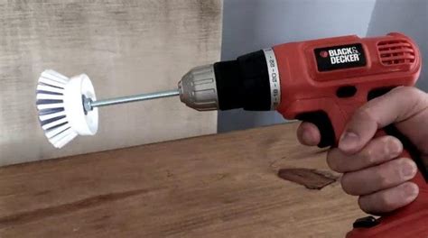 Learn how to turn a soap dispensing brush head into a scrub brush attachment for your drill! He Put A Screw In His Power Drill And Made A Cleaning Tool You Won't Be Able To Live Without!