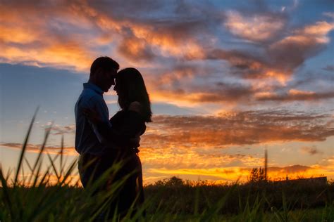 Couple Standing In The Sunset Cuddling All Link Medical Sg