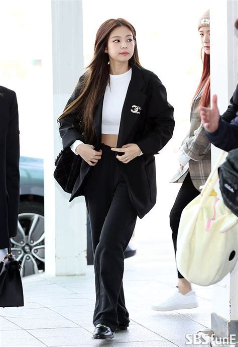 What caught fan's interest was the girls' choice of outerwear that kept them warm all throughout their flight. Jennie Airport Photos at Incheon to Los Angeles on April ...