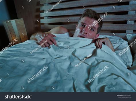 Sleepless Young Man Lying Bed Stressed Stock Photo 1102912052