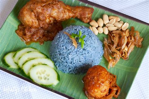Rice infused with fresh undiluted coconut cream, crunchy ground peanut and peeled anchovies, traditional sambal cooked in slow heat for over 5 hours and included gula melaka, dried shrimps, belachan, etc, sliced cucumber, freshly fried sunny side up eggs. Minty's Kitchen: Nasi Lemak