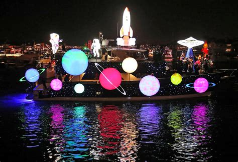 boats decked out in holiday finest illuminate newport harbor for 115th year los angeles times