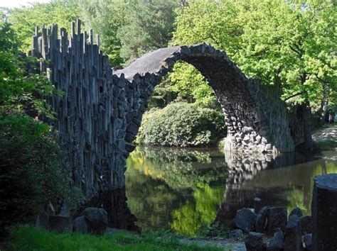 The Devils Bridge In Germanys Kromlau Park Is Designed To Reflect A