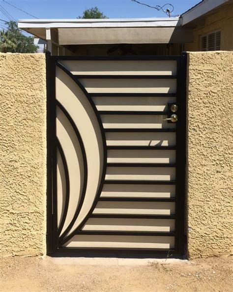 Modern stainless steel gates design fire rated steel door. Odyssey | Door gate design, House gate design, Gate ...