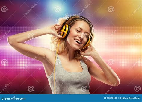 Beautiful Woman With Headphones Listening Music Editorial Stock Image