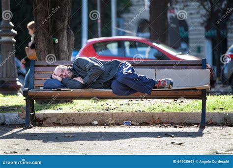 Homeless Man Sleeping On The Bench Poverty Editorial Stock Photo