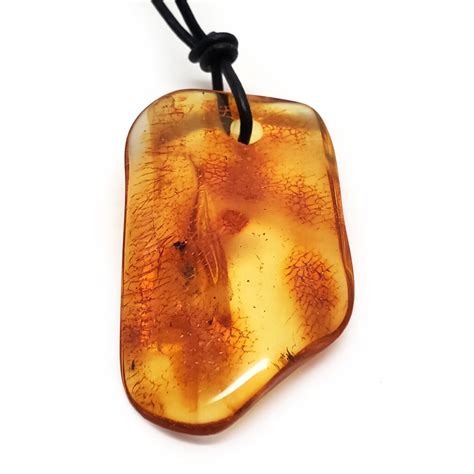 Amber Freeform Drilled Pendant The Fossil Cartel