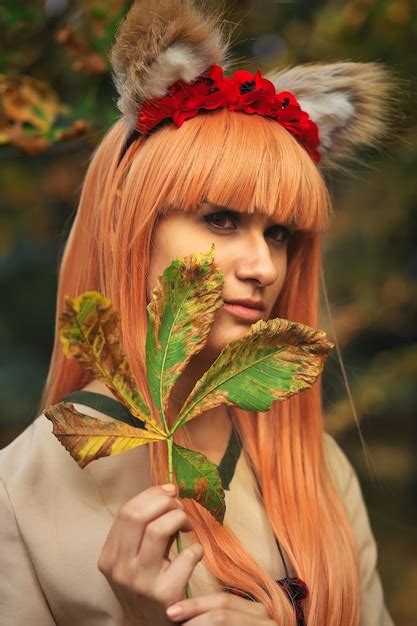 Premium Photo Wolf Girl Cosplay Character In Autumn Park Anime Festival
