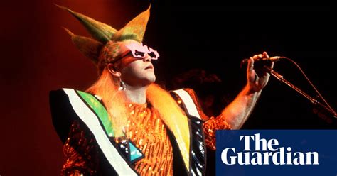 Your Style Elton Johns Fashion Through The Years In Pictures