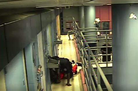 rare video from inside rikers island jail shows inmate being beaten by guards and a gang
