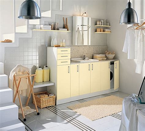 A beautiful white laundry room should have sleek, flat panel white cabinets, with white washing machines, mats, floor and even wall. White and Colored Laundry Room Cabinets from Idea Group ...