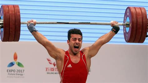 Iranian Weightlifter Rostami Sets New Record Wins First Rio Gold For Iran