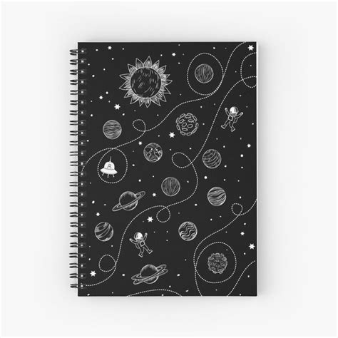 A Spiral Notebook With Planets And Sun On It In Black And White Colors