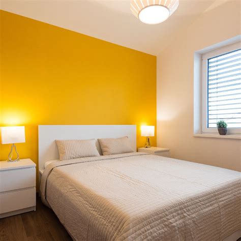 For A Stylish Look Yellow Walls Living Room Living Room Wall Color