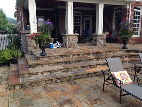 Known for its timeless elegance and beauty, flagstone, when used in patios and complemented with fire pits, makes for a classic, earthy, and relaxing outdoor space. Custom built flagstone patio designed by Chattanooga ...