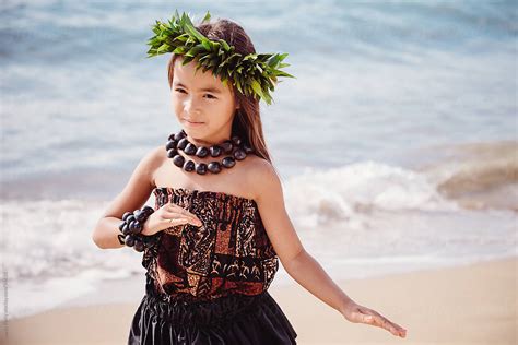 Young Girl Traditional Hawaiian Hula Dancer Performing On The Beach By