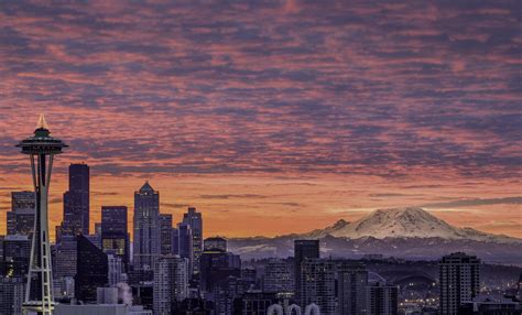 The Seattle Skyline With Mount Rainier And A Gorgeous Sunset In The
