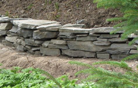 Build A Stacked Stone Garden Wall Stone Retaining Wall