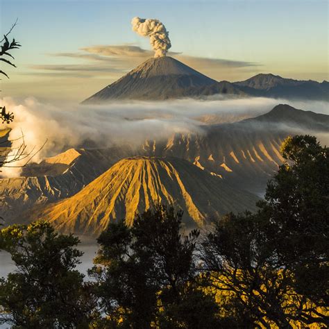 Photography Of Gray Volcano With Blue Sky As Background Mount Bromo