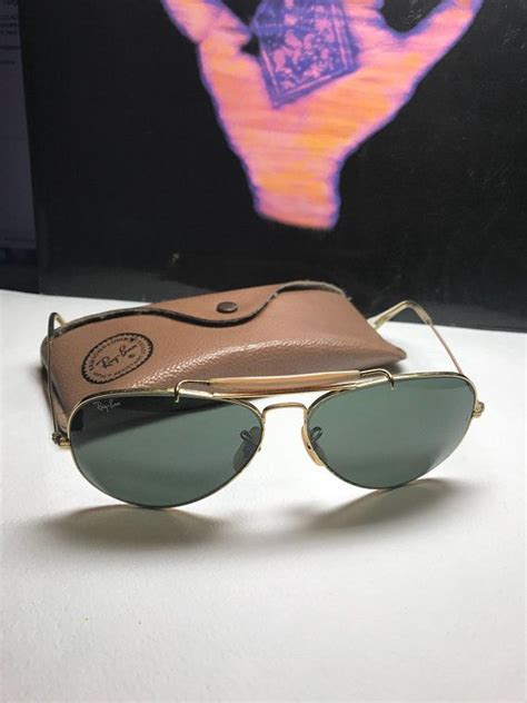 bausch and lomb vintage ray ban aviator sunglasses with grey green impact resistant lenses in