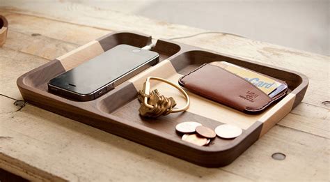 Place this tray on your desk or dresser, where you can easily toss the contents of your pockets into it at the end of the day. Pocket Dump: 20 Best Valet Trays for Men | HiConsumption
