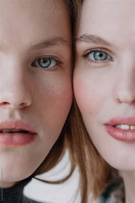Closeup Beauty Portrait Of Two Half Faces Of Pretty Babe Models By