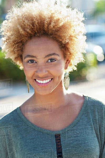 Close Up Of Black Woman Smiling Outdoors Stock Photo Dissolve