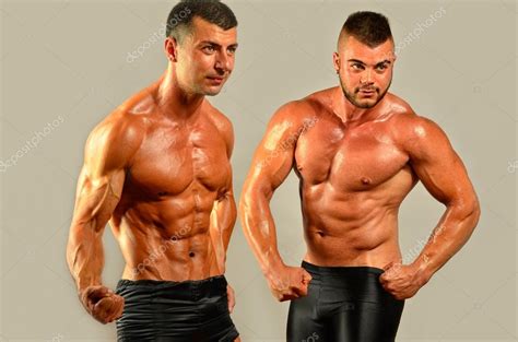 Fit Body Versus Fat Body Flexing Muscles Two Men Showing Their