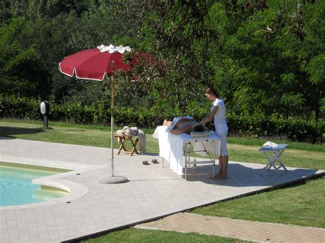 A Massage By The Pool How Does It Look Patio Umbrella Outdoor