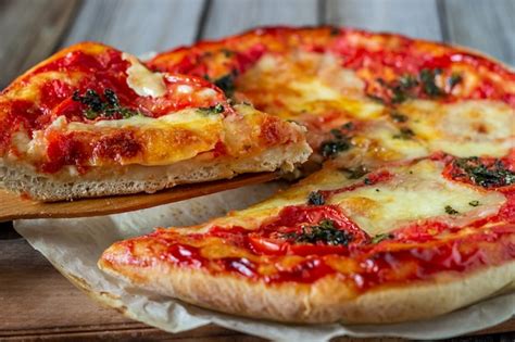 Premium Photo Italian Pizza With Tomatoes And Mozzarella Cheese